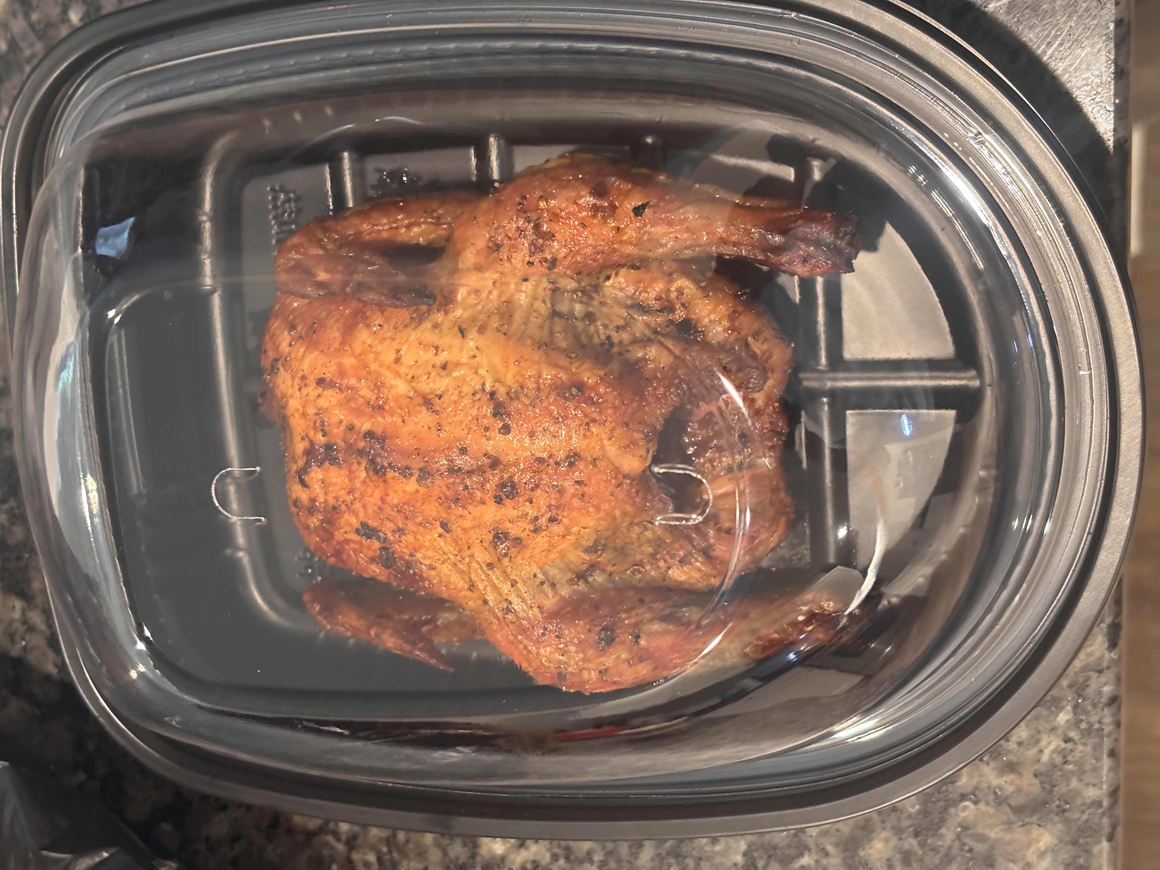 Whole rotisserie-style seasoned chicken