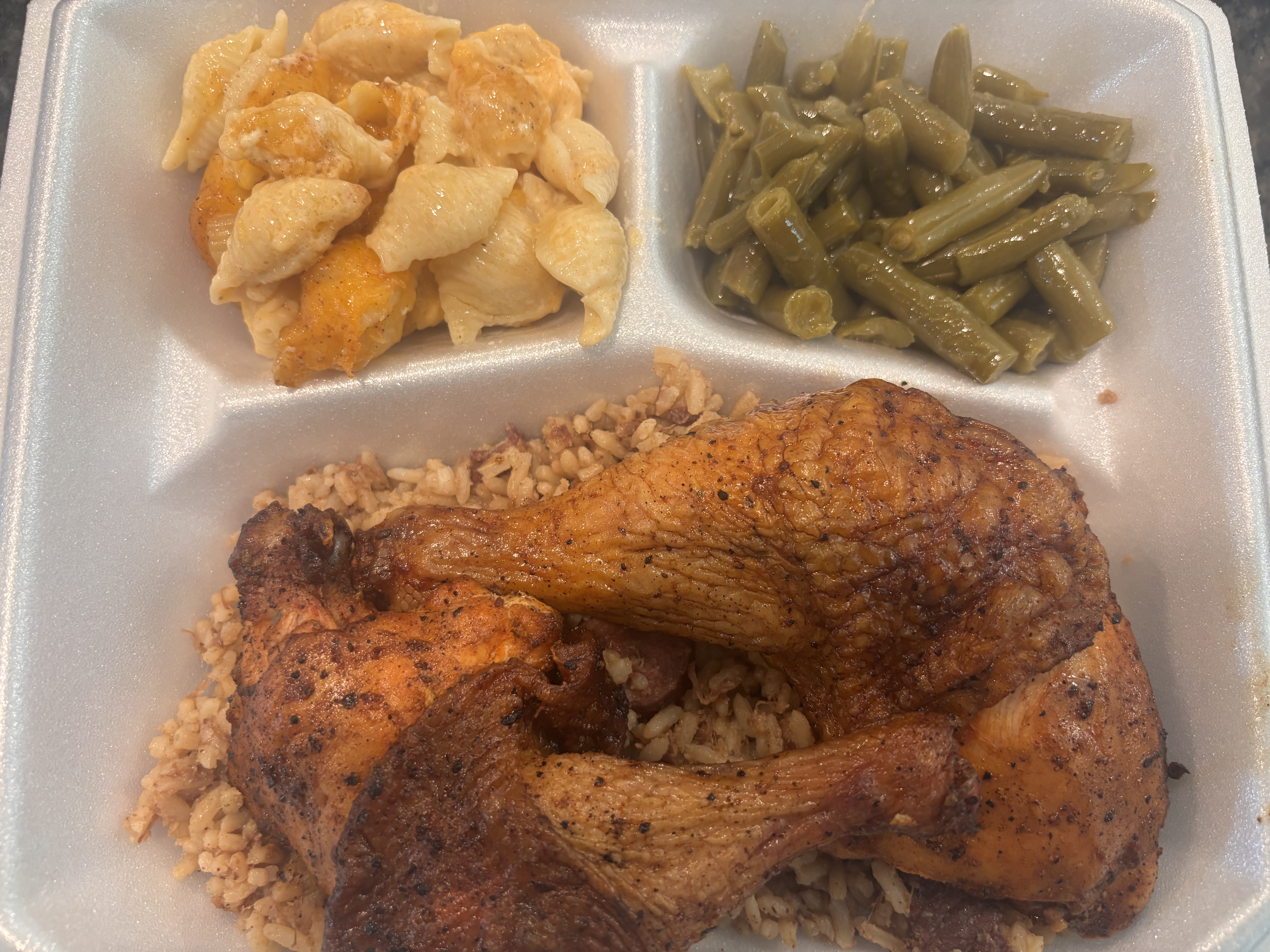 Southern fried chicken plate with rice and green beans