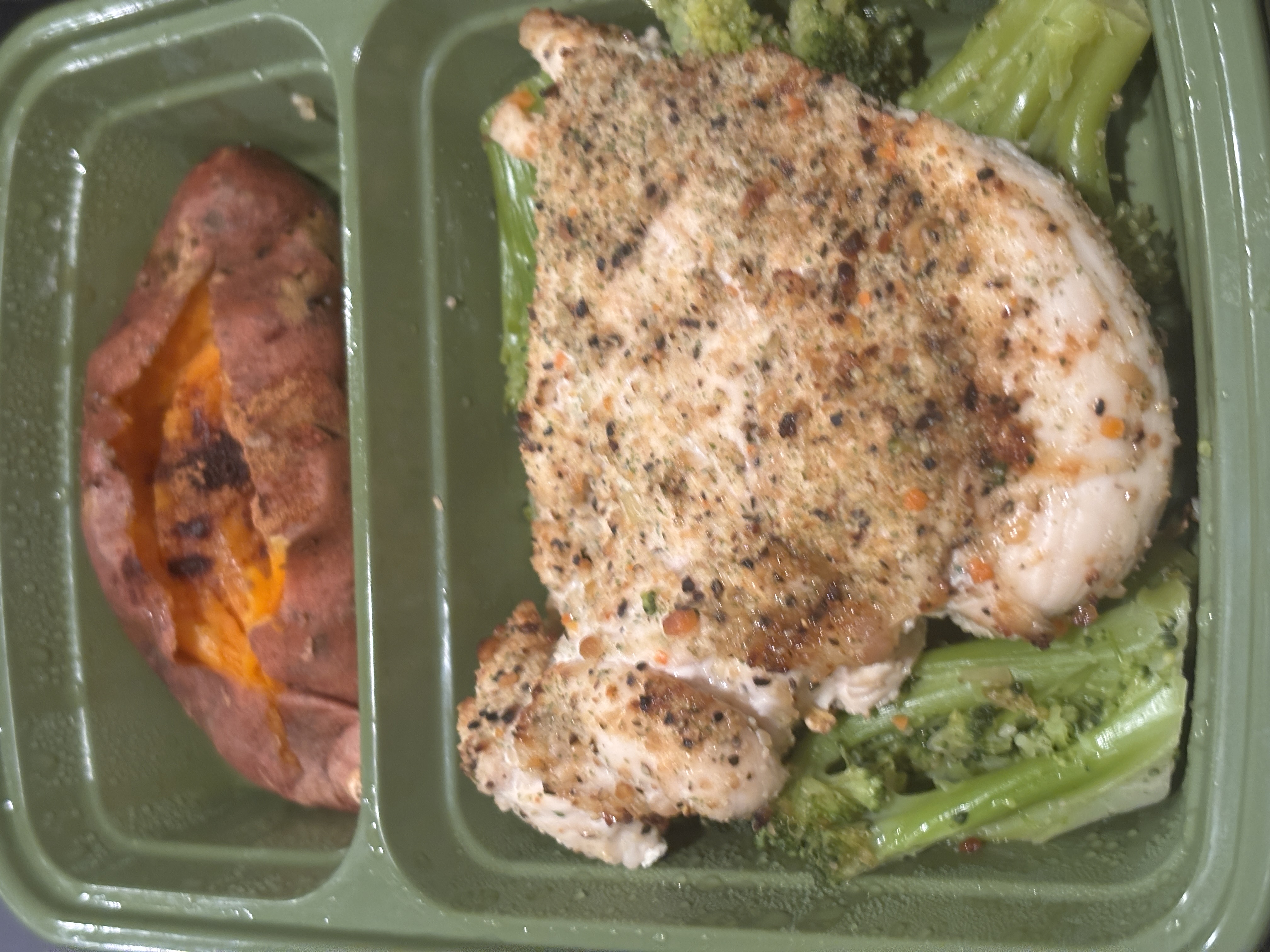 Meal prep of shrimp over rice with lemon