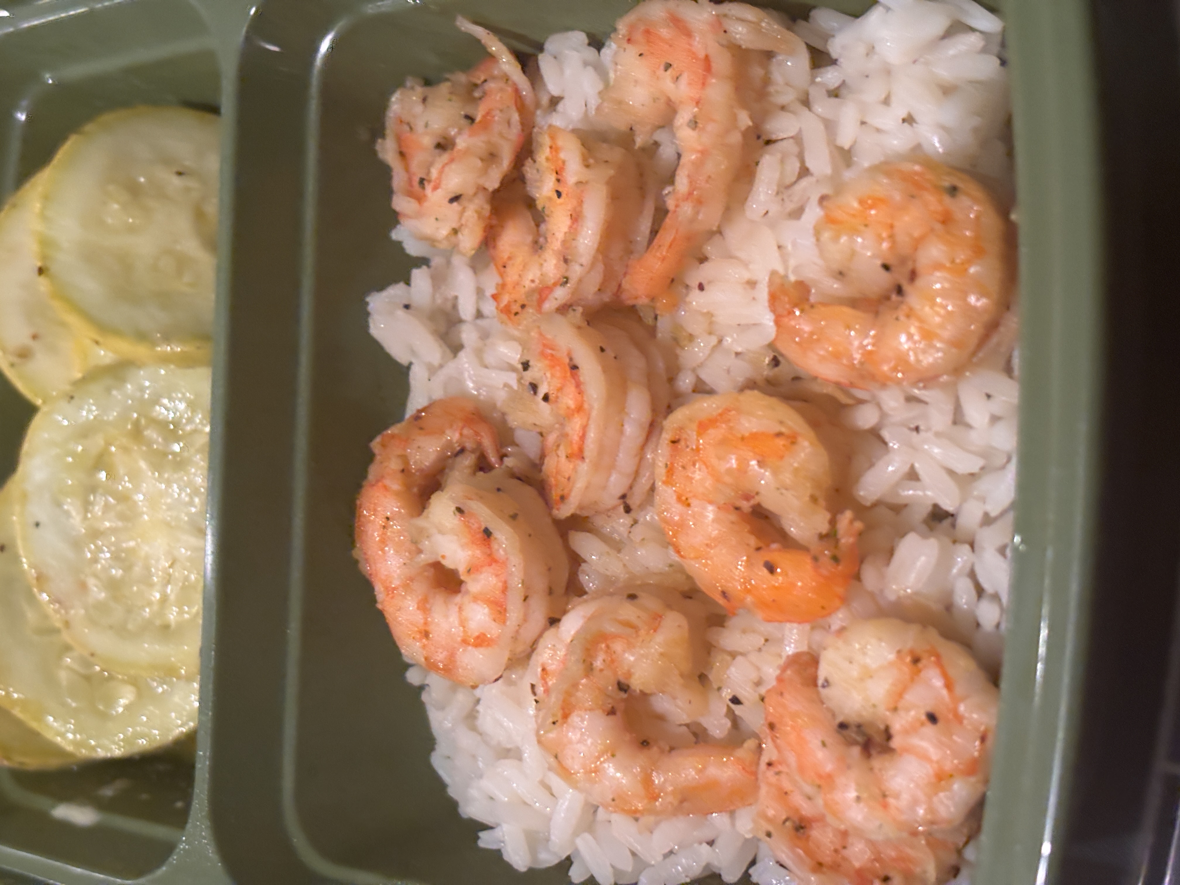 Meal prep with shrimp, sides, and rice