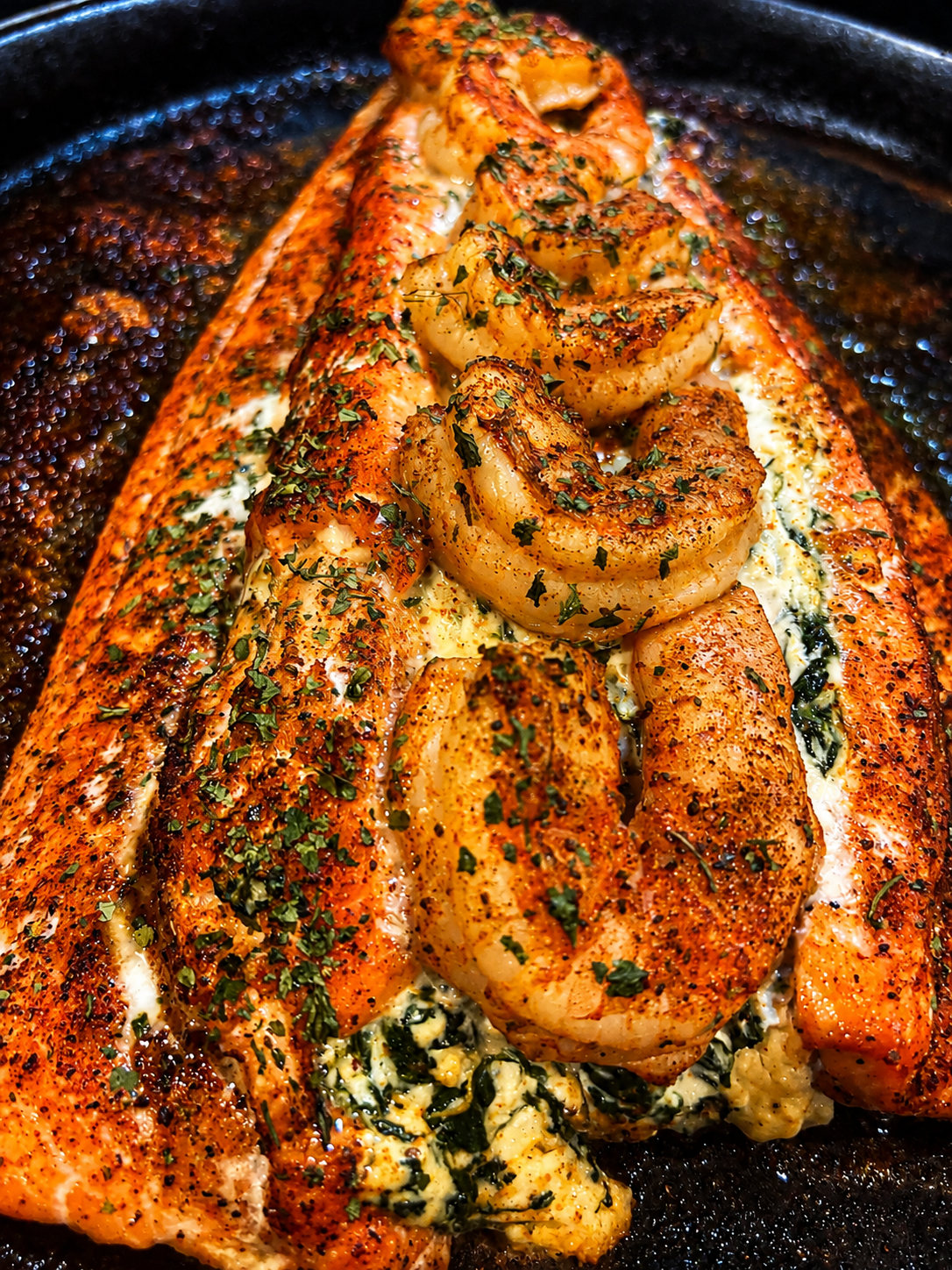 Blackened salmon and shrimp platter with lemon