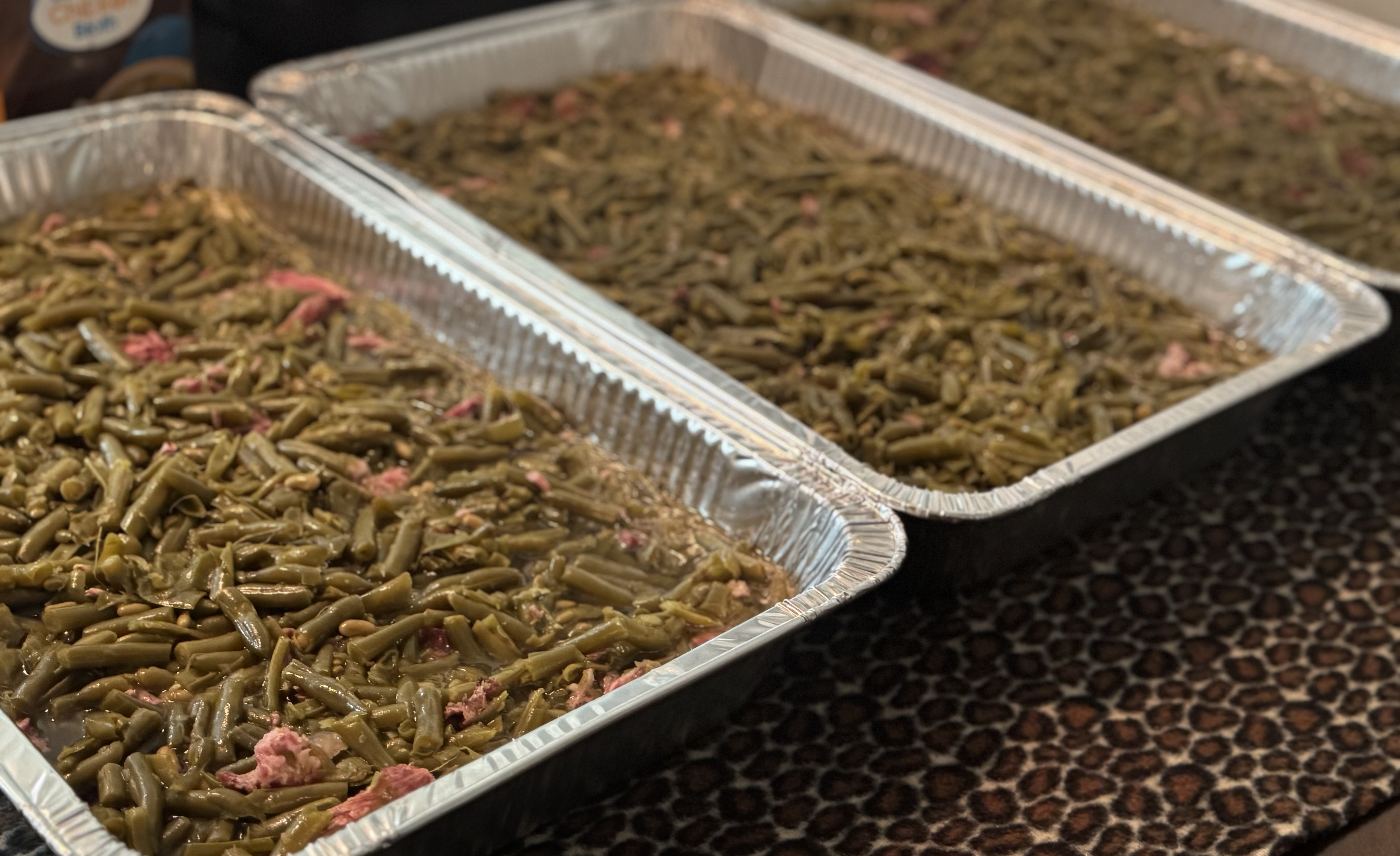 Trays of seasoned green beans ready to serve