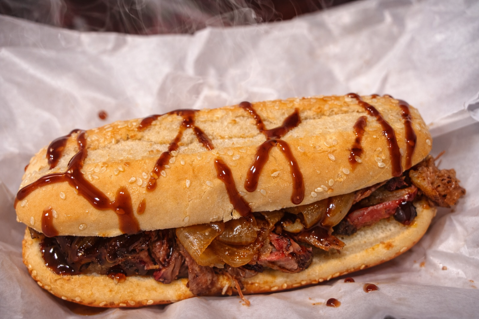 Smoked brisket sub sandwich with barbecue sauce